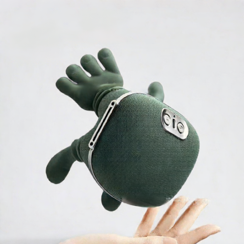 Green plush toy with a zipper pouch on a white background