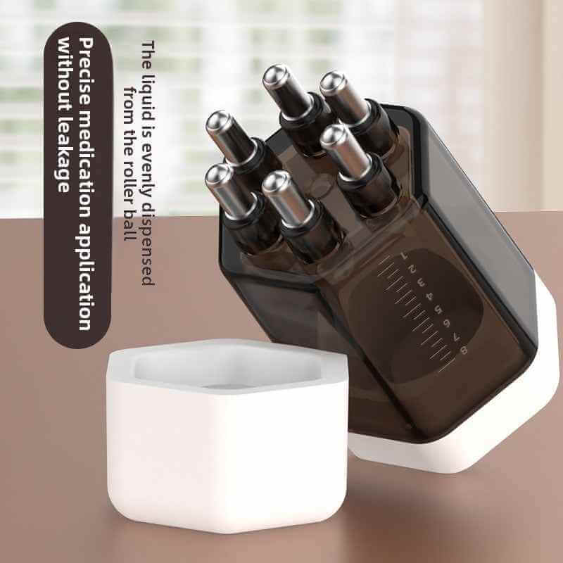 Scalp oil applicator being used to apply hair treatment directly to roots