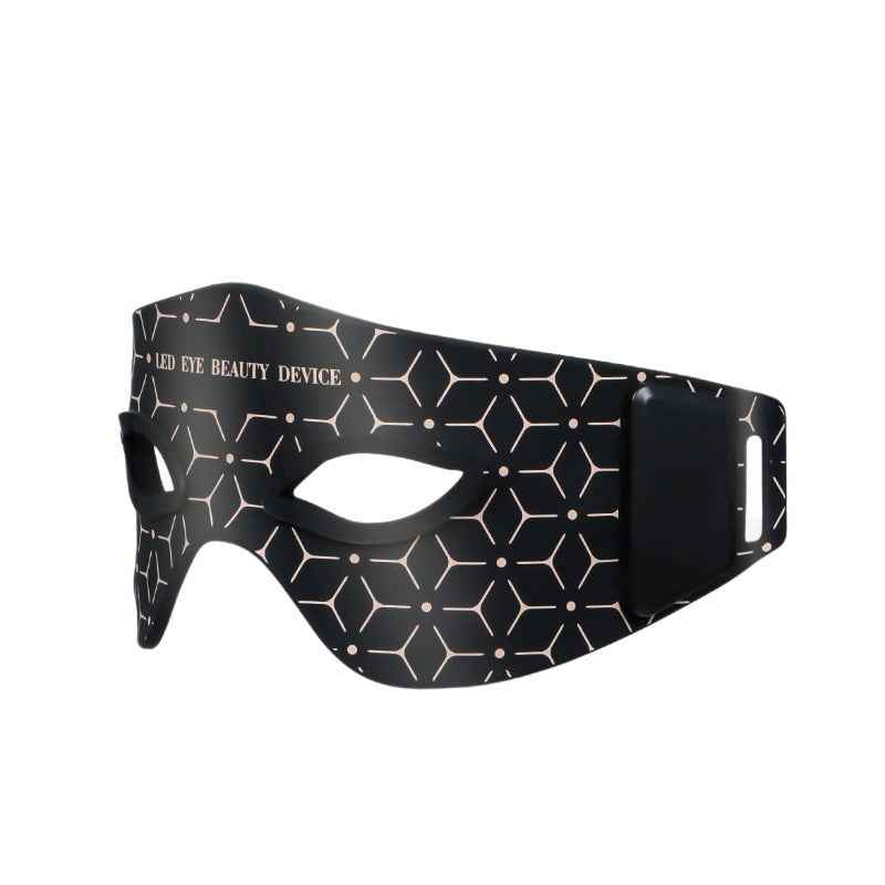 Foldable eye massager with storage bag showing travel-friendly design