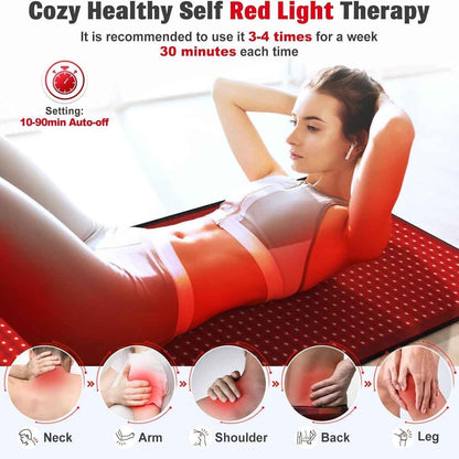 Person lying on red light therapy mat during full-body treatment session